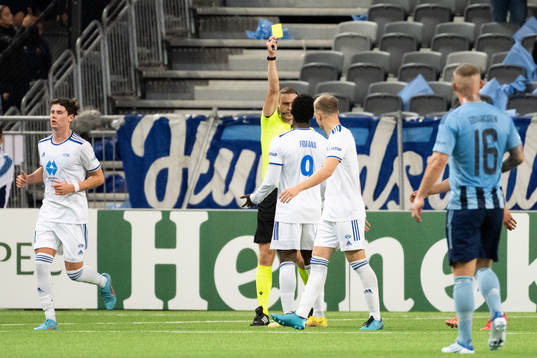 David Fofana of Molde is shown a yellow card