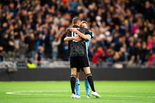Alexandr Vasiutin and Rasmus Schüller celebrate