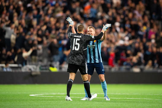 Alexandr Vasiutin and Rasmus Schüller celebrate