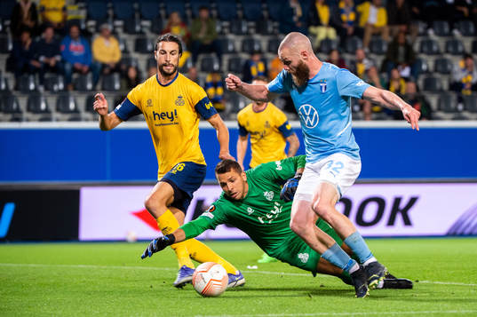 Jo Inge Berget of Malmö FF and Anthony Moris of Royale