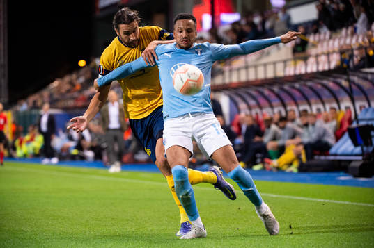 Martin Olsson of Malmö FF and Christian Burgess of Royale