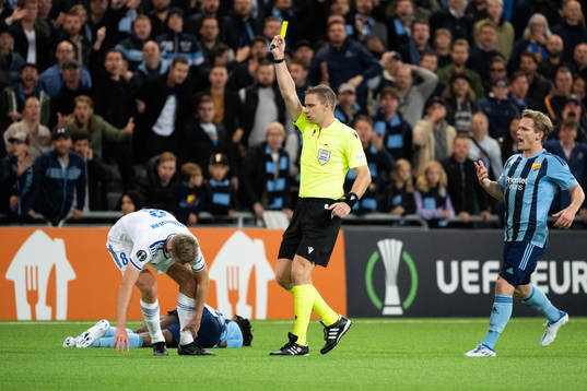 Sivert Mannsverk of Molde is shown a yellow card