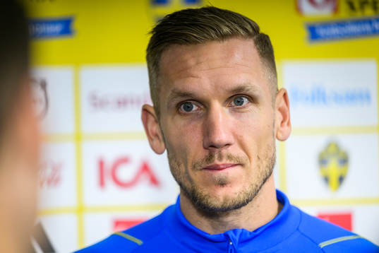 goalkeeper Robin Olsen is being interviewed by media