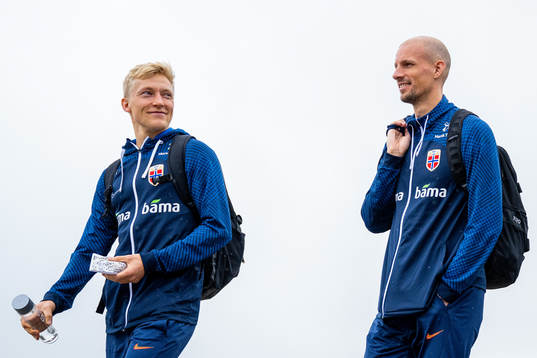 Birger Meling and goalkeeper André Hansen of the Norwegian