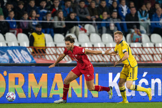 Srdjan Babic of Serbia and Dejan Kulusevski of Sweden