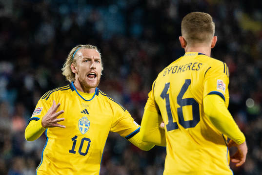 Emil Forsberg and Viktor Gyökeres of Sweden celebrate the