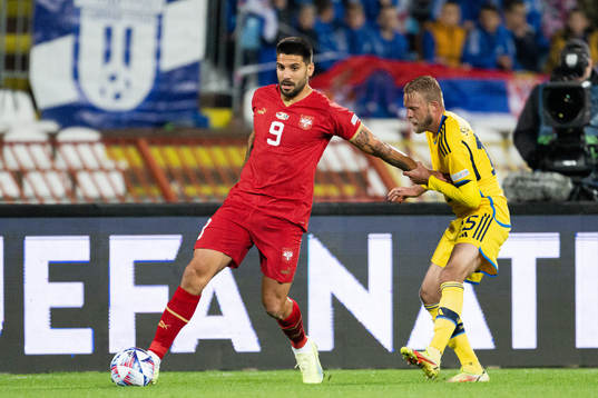 Aleksandar Mitrovic of Serbia and Daniel Sundgren of Sweden