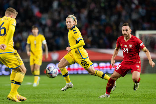 Emil Forsberg of Sweden and Aleksa Terzic of Serbia