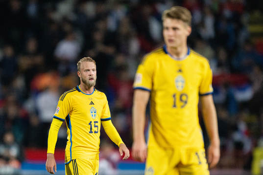 Daniel Sundgren and Mattias Svanberg of Sweden look dejected