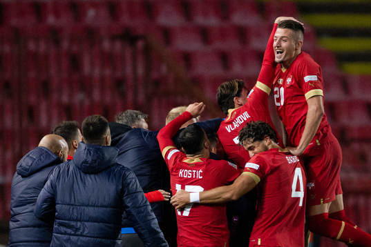 Players of Serbia celebrate the 3-1 goal