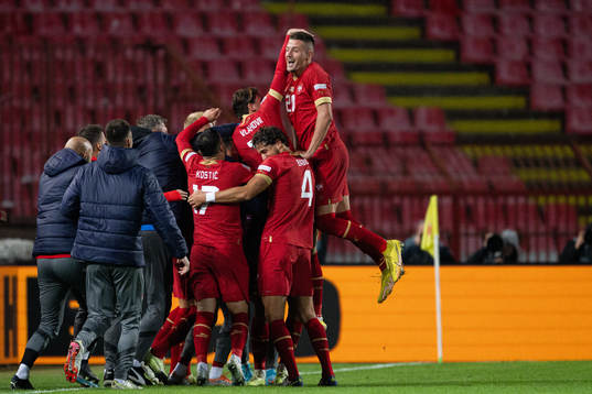Players of Serbia celebrate the 3-1 goal
