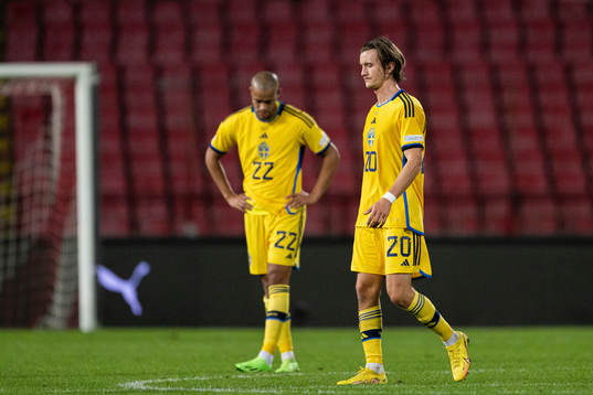 Robin Quaison and Kristoffer Olsson of Sweden look dejected