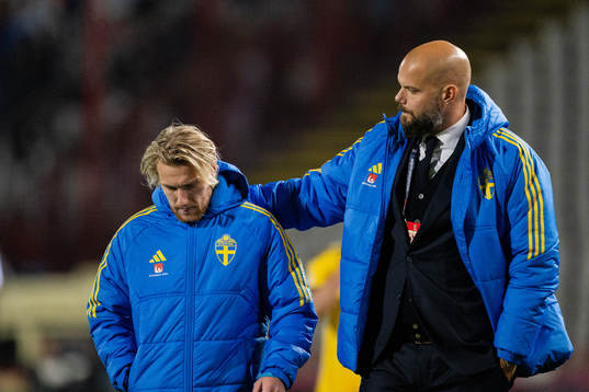 Emil Forsberg and Press officer Jakob Kakembo Andersson of