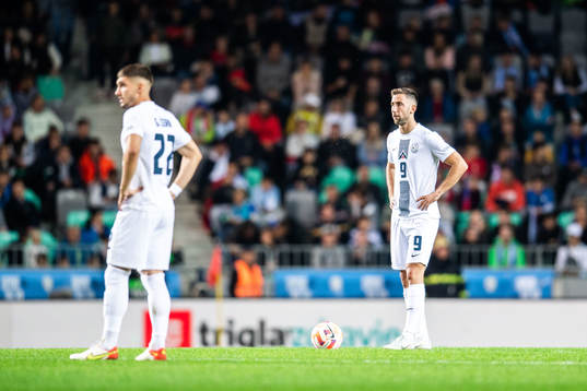 Andraz Sporar of Slovenia looks dejected