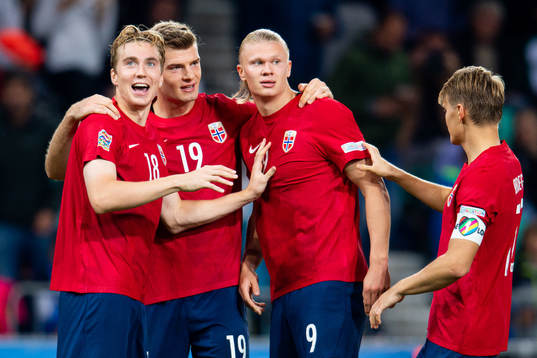 Erling Braut Haaland of Norway celebrates with teammates