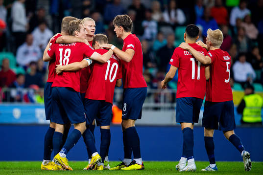 Erling Braut Haaland of Norway celebrates with teammates