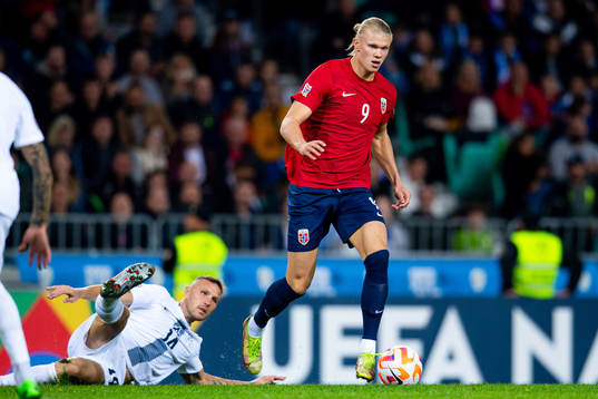 Jasmin Kurtic of Slovenia and Erling Braut Haaland of Norway