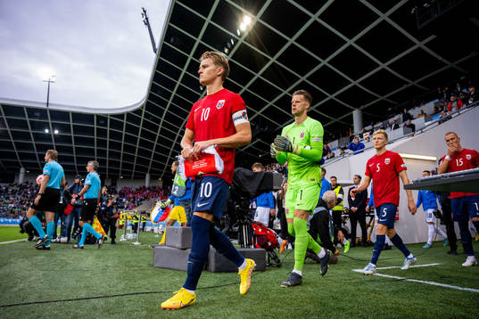 Martin Ødegaard and goalkeeper Ørjan Håskjold Nyland of