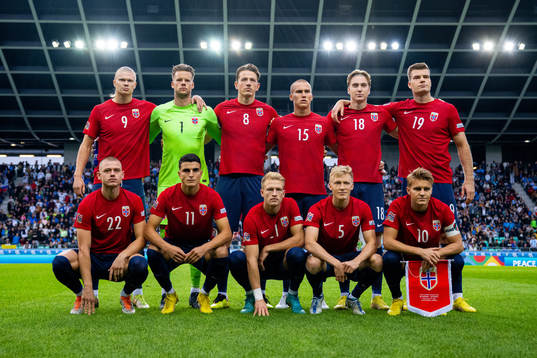 The starting eleven of Norway pose for a team photo