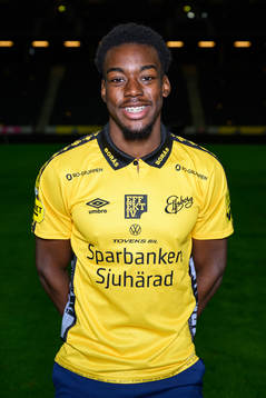 Anthony Elanga poses for a portrait with the jersey of his