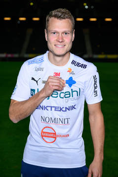 Viktor Claesson poses for a portrait with the jersey of his