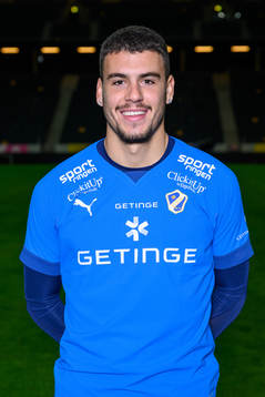 Edvin Kurtulus poses for a portrait with the jersey of his