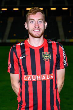 Dejan Kulusevski poses for a portrait with the jersey of