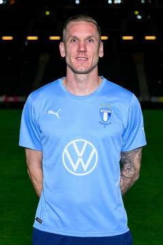 goalkeeper Robin Olsen poses for a portrait with the jersey