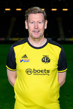 Assistant coach Peter Wettergren poses for a portrait with