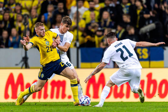 Dejan Kulusevski of Sweden against Jaka Bijol and Benjamin