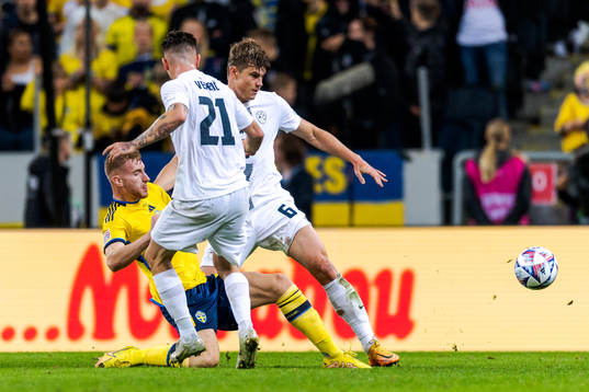 Dejan Kulusevski of Sweden against Jaka Bijol and Benjamin