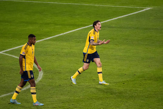 Isak Hien and Victor Nilsson Lindelöf of Sweden looks