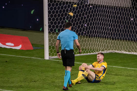 Dejan Kulusevski of Sweden in pain
