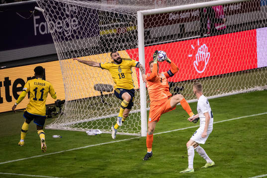 Mikael Ishak of Sweden against Zan Karnicnik of Slovenia