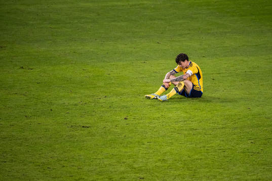 Victor Nilsson Lindelöf of Sweden looks dejected