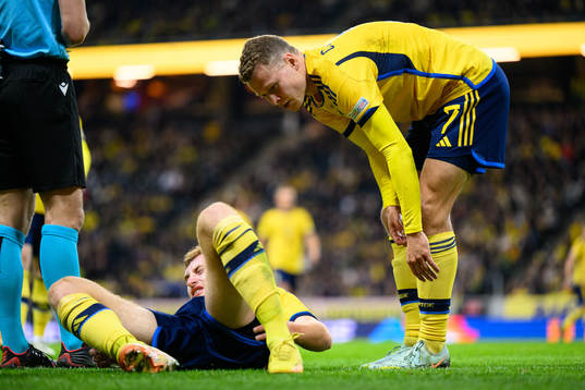 Dejan Kulusevski of Sweden and Viktor Claesson