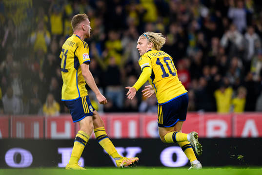 Dejan Kulusevski and Emil Forsberg of Sweden celebrate