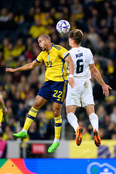 Robin Quaison of Sweden and Jaka Bijol of Slovenia