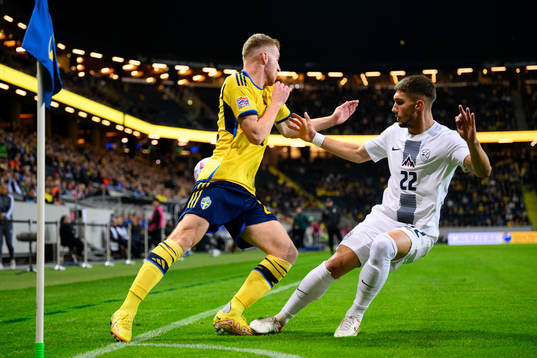 Dejan Kulusevski of Sweden and Adam Gnezda of Slovenia