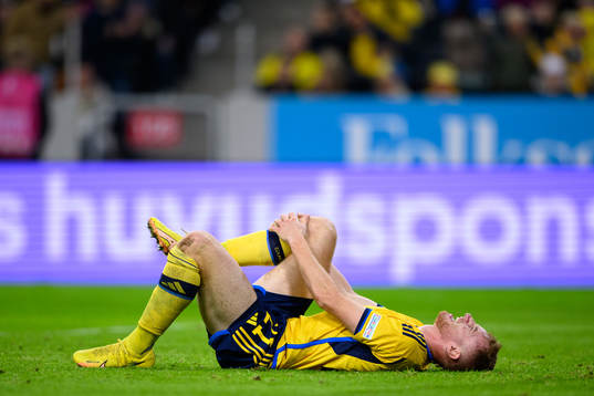 Dejan Kulusevski of Sweden in pain