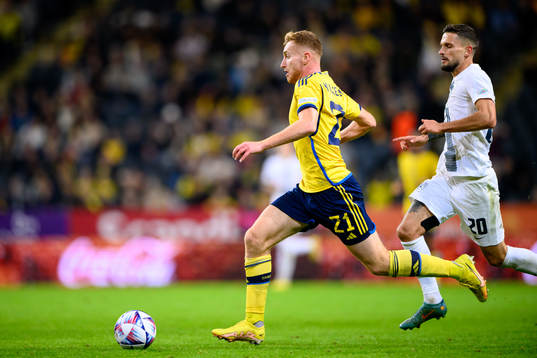 Dejan Kulusevski of Sweden and Petar Stojanovic of Slovenia