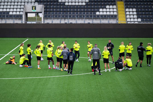 The team gather