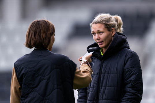 goalkeeper Jennifer Falk is interviewed