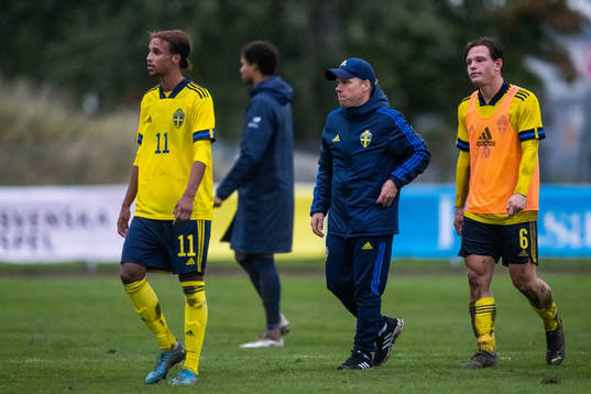 Sveriges Shakur Omar, förbundskapten Viktor Eriksson och
