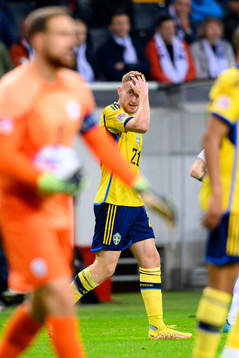 Dejan Kulusevski of Sweden looks dejected