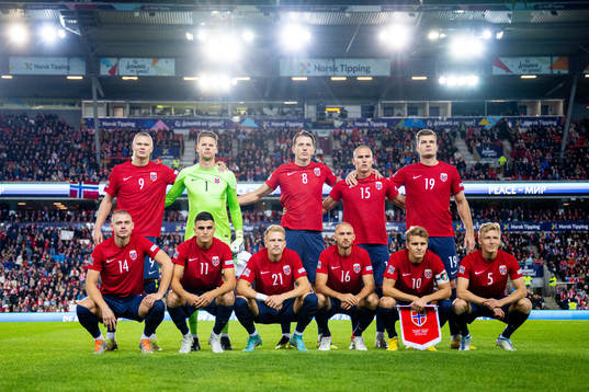 The staring eleven of Norway poses for a photo ahead the