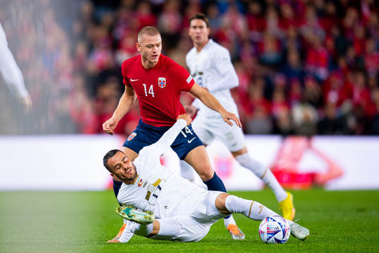 Filip Kostic of Serbia and Julian Ryerson of Norway