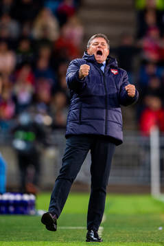 Head coach Dragan Stojkovic of Serbia celebrates the 0-1