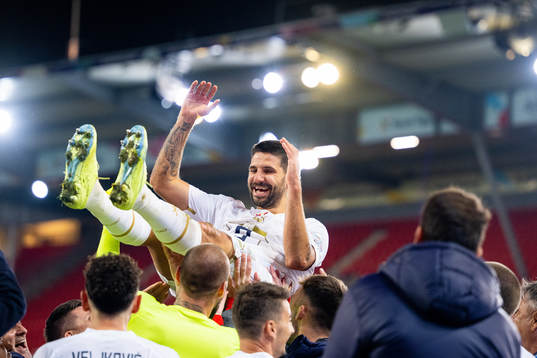 Aleksandar Mitrovic of Serbia celebrate