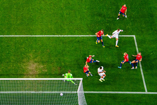 Dusan Vlahovic of Serbia scores 0-1 behind goalkeeper